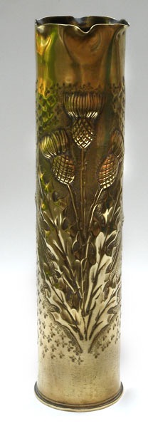 Shell Scottish&nbsp; Thistle on a n embossed background of cross-shaped petals punches. 