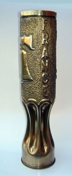 Shell with Liberty Bell and France&nbsp; inscribed in vertical on the right side.