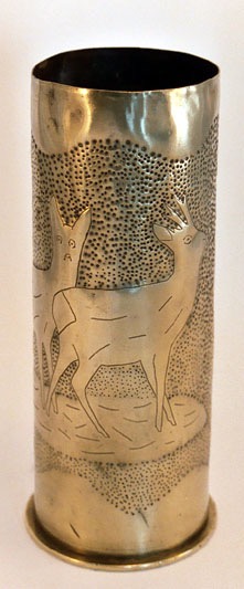 Shell with two deer venturing in the open. Stippled background.