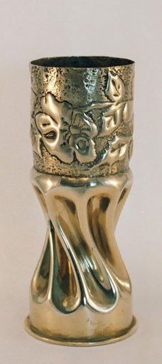 Shell fluted and twisted. Upper part&nbsp; with flowers