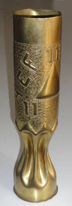 Shell 6th Division with letters AEF, a triangle&nbsp; with number eleven at each point.