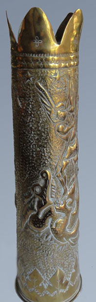 Shell with Michael and dragon coiling around spear.