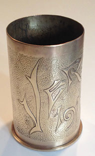 Shell VERDUN IN traditional calligraphy on an embossed background.