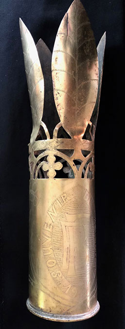 Pair of shells with honeycombed body, traces of dark paint, one with patina, the other polished.