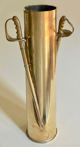 Shell with soldered sabers as handles.&nbsp; H.13. 3/4"
