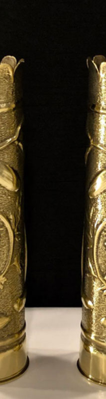 Pair of shells with scalloped tops, same design of garlands around medallions with Doughboy facing Poilu.