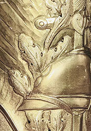 Shell with symbols as oak, olive, sunburst. Adrian helmet resting on sword is also found on WWI monuments and medals.