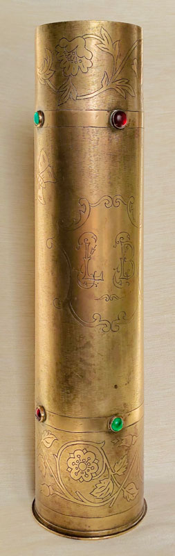 Top and bottom of engraved garlands of flowers. Four sets of colored glass cabochons. Ornate medallion with initials.