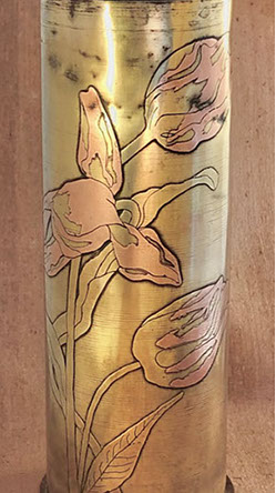 Shell with tulips. The petals are enhanced with copper.