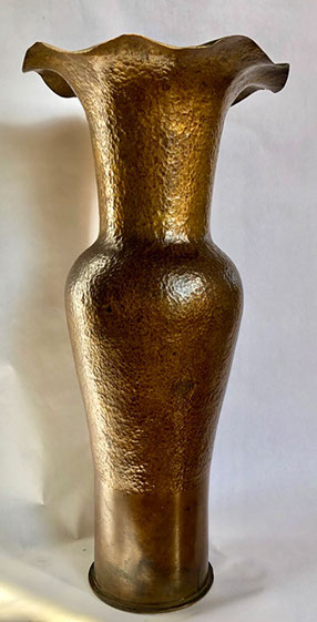 Tall shell marked Washington Naval Yard 1907, hammered into a vase by Arts & Crafts Movement artist near San Francisco.