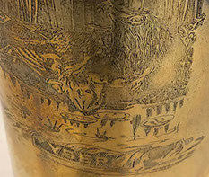 Shell's lower part is engraved with a roaring Lion of Flanders, all claws out, defending the&nbsp; flag against hovering German Eagle.