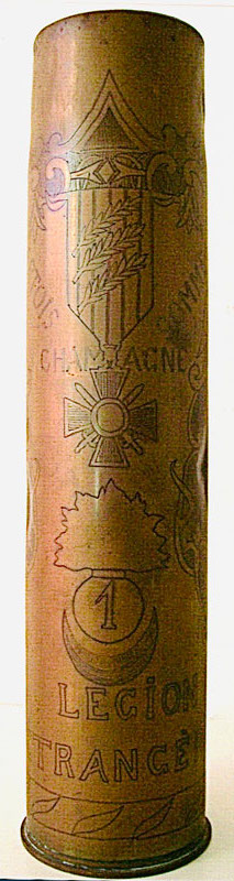 Shell engraved with Croix de guerre with three palms, ARTOIS, CHAMPAGNE, SOMME, flaming bomb with #1 and LEGION ETRANGERE
