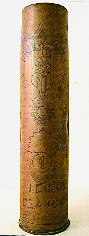 Shell engraved with Croix de guerre with three palms, ARTOIS, CHAMPAGNE, SOMME, flaming bomb with #1 and LEGION ETRANGERE