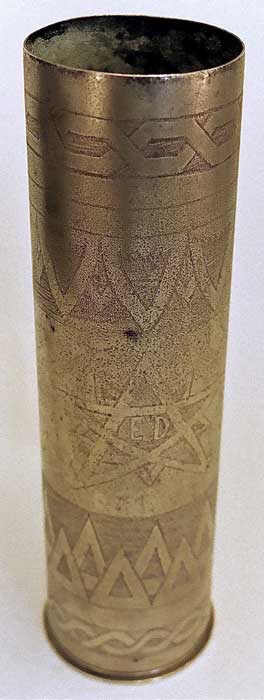 Engraved with geometrical patterns. Initials ED in a ten-pointed star. Upper decorative band, zig-zag work.