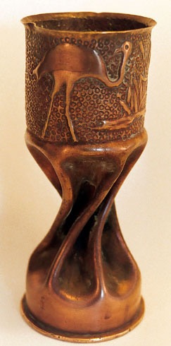 Shell with two flamingos next to reeds, body fluted and twisted.