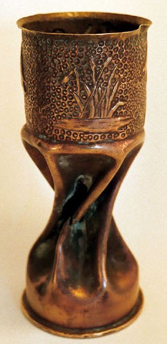 Shell with flamingos and marshland reeds. background of small circles.