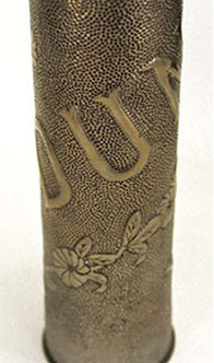 Shell VERDUN with a spiraling garland of flowers.