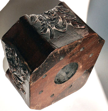 Propeller boss showing the&nbsp; original bolts holes , the center hole and detals of carved foliage on the sides.