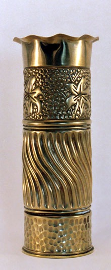 Pair of shell with rippled body, pie crust top,top band with flowers, lower band embossed.