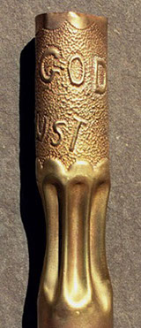 Shell "in God We Trust". Body fluted.