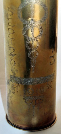 Shell engraved ARGONNE, and SEPT. 26 on left of Caduceus.