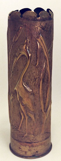 Shell with ibis in a marshland. Top scalloped inwards. Hatched background.