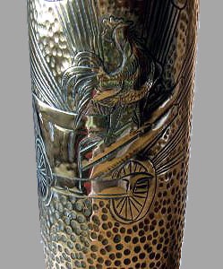 Shell with a Gallic Rooster proudly perched on a 75 mm cannon. Rising sun behind, and&nbsp; band of oak leaves