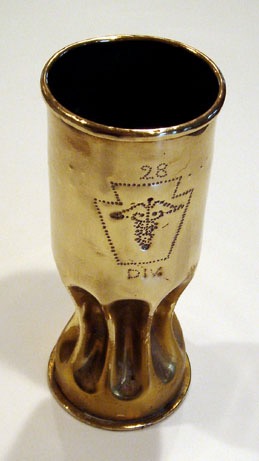 Fluted shell 28th Division.Number 28,&nbsp; Keystone with Caduceus engraved in dot technique.