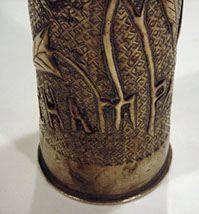 Shell Tahure Champagne, letters M and P extended as stems for flowers. 1918.